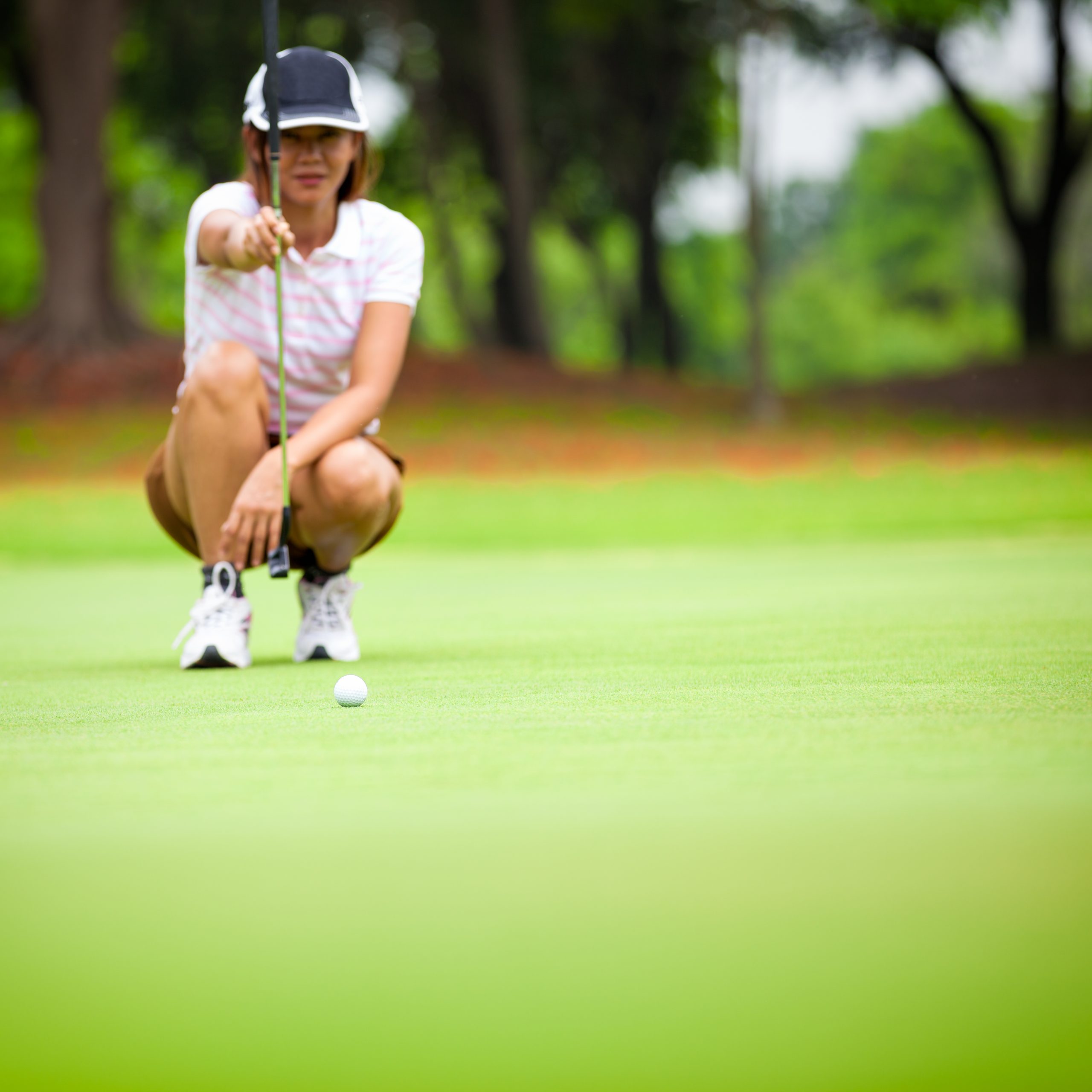 Woman Golfing